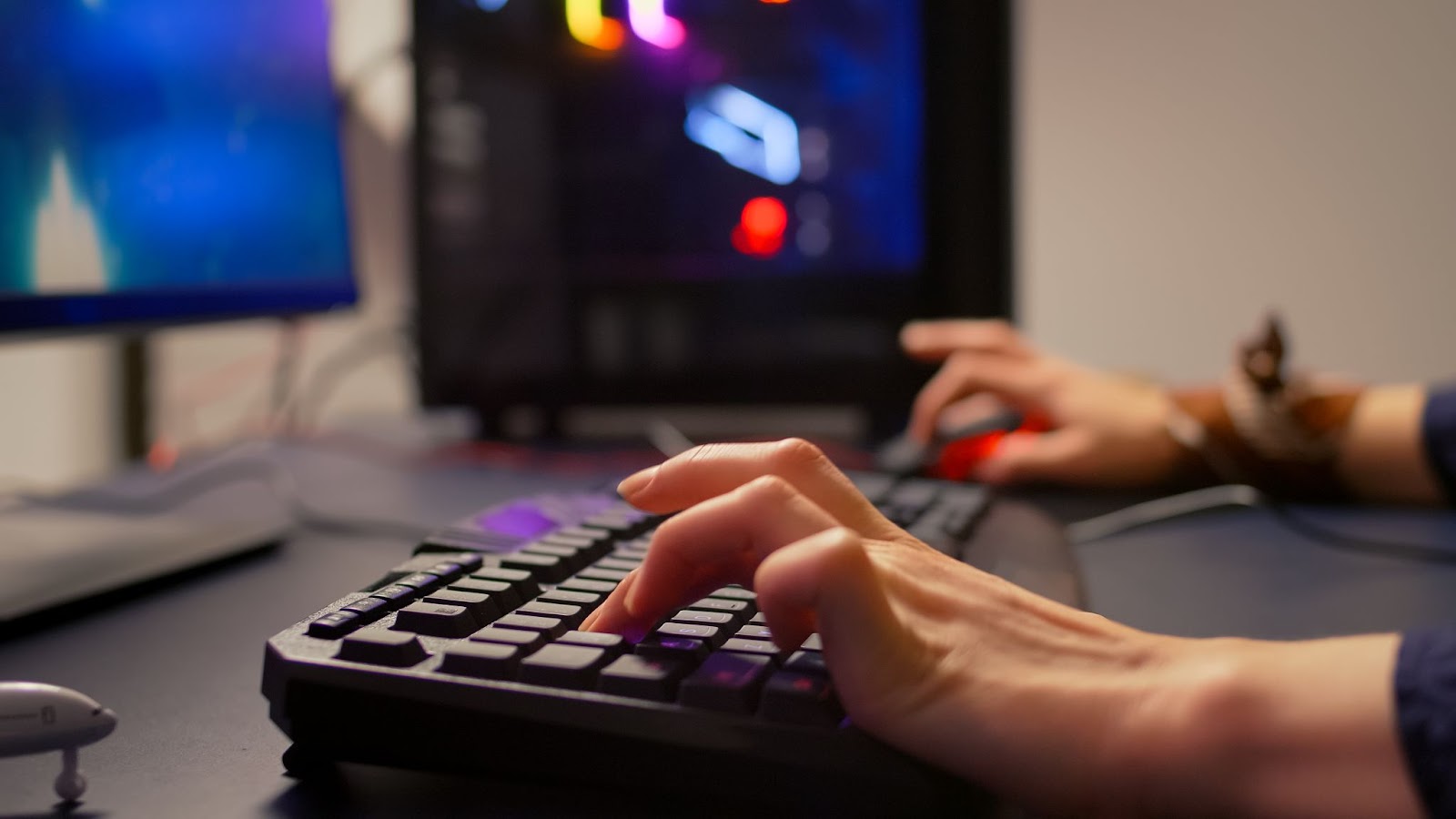 A woman playing on a computer