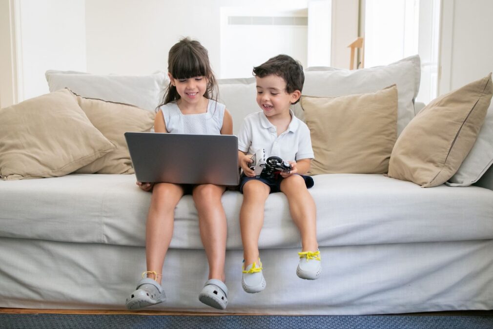 A boy and a girl playing video games