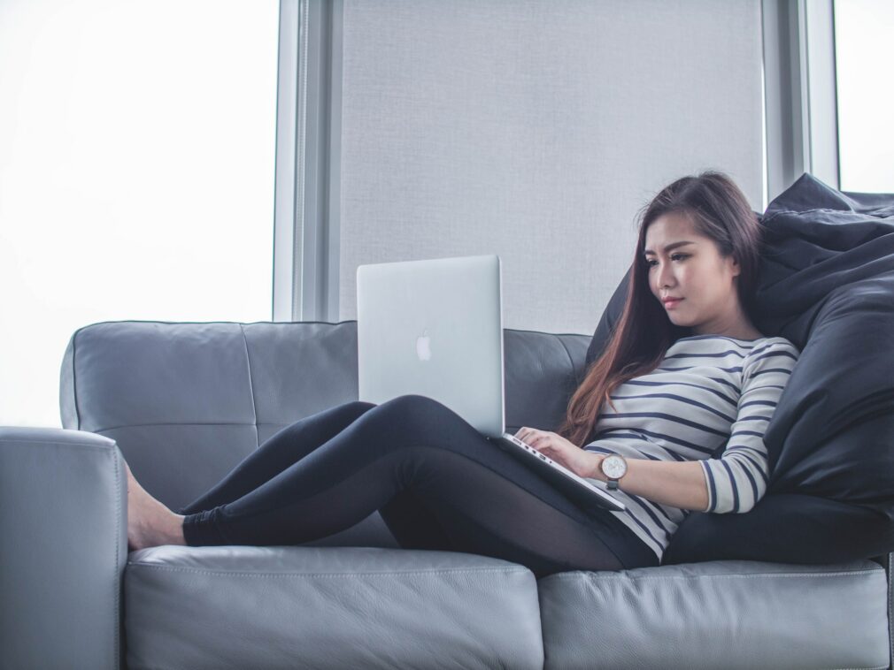 man sitting with laptop