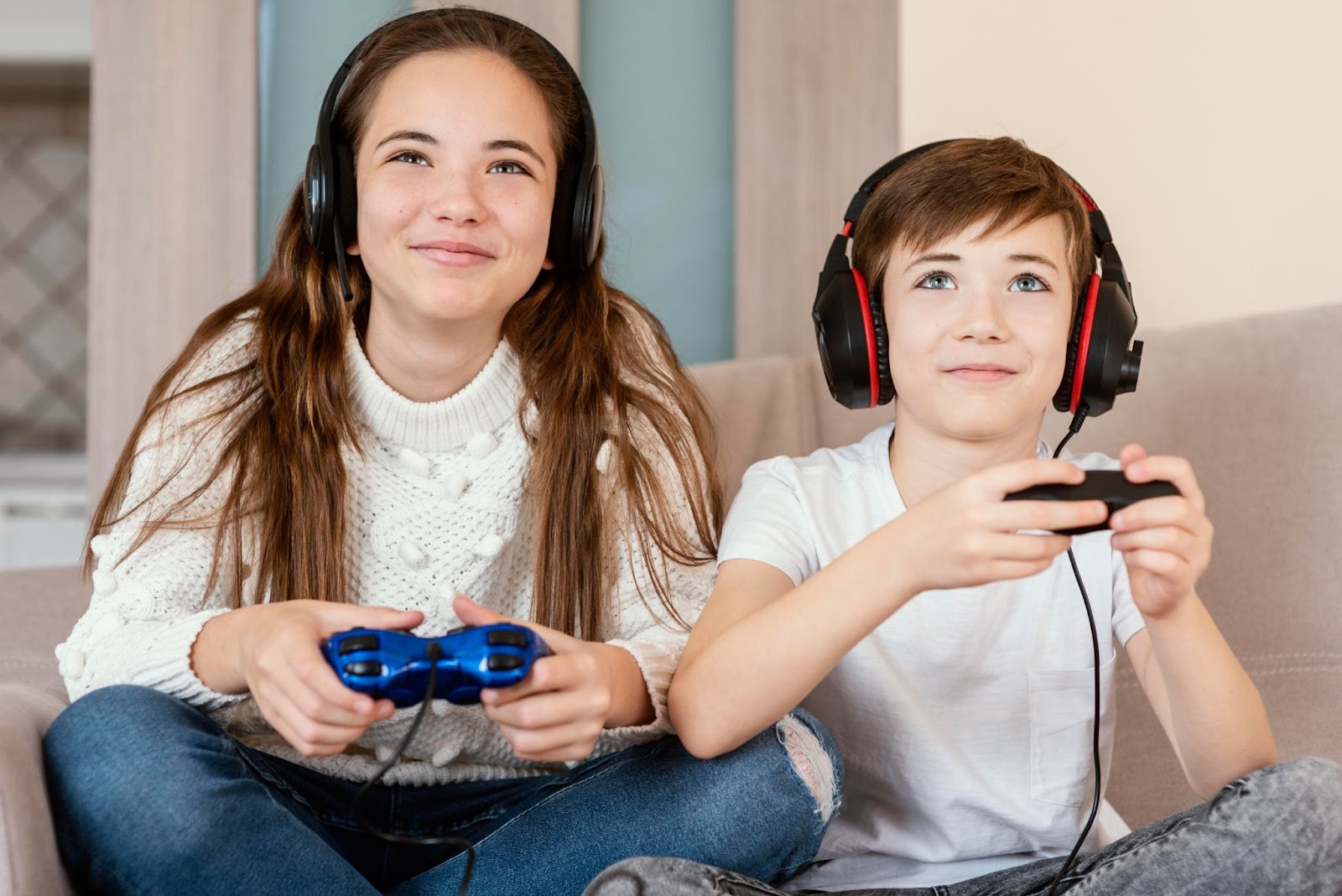 Brother and sister playing video games