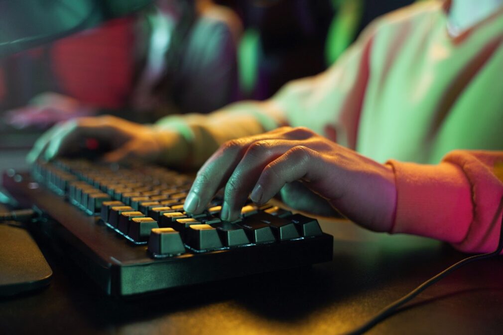 Hands typing on keyboard